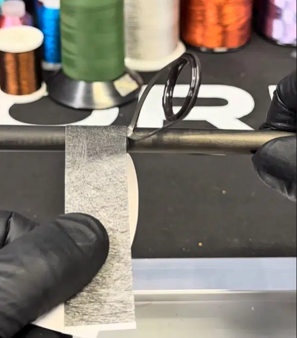 wrapping a guide in air carbon mesh for rod building